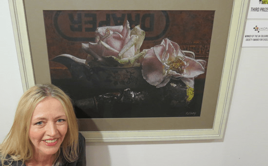 Patsy Whiting with her prizewinning work - "Garden garage marriage"